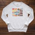 Say Gay Protect Trans Kids Read Banned Books LGBTQ Gay Pride Raglan Sleeve Sweatshirt Heather Mustard
