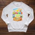 Summer Reading 2026 Unearth a Story Book Reading Raglan Sleeve Sweatshirt Heather Mustard Summer Reading 2026 Unearth a Story Book Reading Raglan Sleeve Sweatshirt Heather Mustard