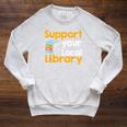 Support Your Local Library Book Reading Raglan Sleeve Sweatshirt Heather Mustard Support Your Local Library Book Reading Raglan Sleeve Sweatshirt Heather Mustard