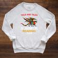 Tails And Tales Summer Reading 2022 Book Reading Teen Dragon Raglan Sleeve Sweatshirt Heather Mustard Tails And Tales Summer Reading 2022 Book Reading Teen Dragon Raglan Sleeve Sweatshirt Heather Mustard