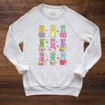 Teacher Easter Reading Bunnies Book Lover Bunny Raglan Sleeve Sweatshirt Heather Mustard