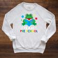Team Pre-School Reading Frog Back To School Book Lover Raglan Sleeve Sweatshirt Heather Mustard Team Pre-School Reading Frog Back To School Book Lover Raglan Sleeve Sweatshirt Heather Mustard