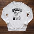Tucson Festival Of Books TFOB 2017 Roadrunner Mascot Raglan Sleeve Sweatshirt Heather Mustard Tucson Festival Of Books TFOB 2017 Roadrunner Mascot Raglan Sleeve Sweatshirt Heather Mustard