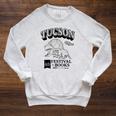 Tucson Festival Of Books TFOB 2023 Racoon Mascot Raglan Sleeve Sweatshirt Heather Mustard