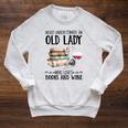 Never Underestimate An Old Lady Who Loves Books And Wine Raglan Sleeve Sweatshirt Heather Mustard Never Underestimate An Old Lady Who Loves Books And Wine Raglan Sleeve Sweatshirt Heather Mustard