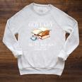 Never Underestimate An Old Lady Who Read Many Books February Raglan Sleeve Sweatshirt Heather Mustard Never Underestimate An Old Lady Who Read Many Books February Raglan Sleeve Sweatshirt Heather Mustard