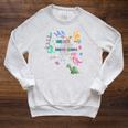 Unearth a Story Dinosaur Book 2026 Summer Reading Program Raglan Sleeve Sweatshirt Heather Mustard Unearth a Story Dinosaur Book 2026 Summer Reading Program Raglan Sleeve Sweatshirt Heather Mustard