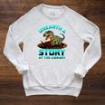 Unearth A Story At The Library Dinosaur Reading Raglan Sleeve Sweatshirt Heather Mustard