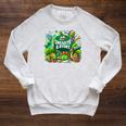 Unearth a Story Library Summer Reading 2026 Dinosaur Book Raglan Sleeve Sweatshirt Heather Mustard