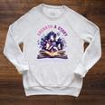 Unearth a Story Summer Library Reading 2026 Butterfly Book Raglan Sleeve Sweatshirt Heather Mustard