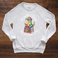 Unearth a Story Summer Reading 2026 Book Lover Dino Fun Raglan Sleeve Sweatshirt Heather Mustard Unearth a Story Summer Reading 2026 Book Lover Dino Fun Raglan Sleeve Sweatshirt Heather Mustard