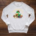 Unearth A Story Summer Reading 2026 Dinosaur Book Floral Raglan Sleeve Sweatshirt Heather Mustard Unearth A Story Summer Reading 2026 Dinosaur Book Floral Raglan Sleeve Sweatshirt Heather Mustard