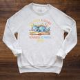 Unearth a Story Summer Reading 2026 Dinosaur Books Dino Raglan Sleeve Sweatshirt Heather Mustard Unearth a Story Summer Reading 2026 Dinosaur Books Dino Raglan Sleeve Sweatshirt Heather Mustard