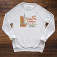 Unearth a Story Summer Reading 2026 Library Teachers Book Raglan Sleeve Sweatshirt Heather Mustard Unearth a Story Summer Reading 2026 Library Teachers Book Raglan Sleeve Sweatshirt Heather Mustard