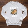 Unearth A Story Summer Reading Program 2026 Capybara Book Raglan Sleeve Sweatshirt Heather Mustard
