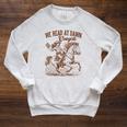 Western Life Book Lover Reading We Reads At Dawn Cowgirls Raglan Sleeve Sweatshirt Heather Mustard