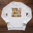 Wild About Reading Book Animal Book Lover Teacher Kids Raglan Sleeve Sweatshirt Heather Mustard Wild About Reading Book Animal Book Lover Teacher Kids Raglan Sleeve Sweatshirt Heather Mustard