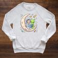 Women's Astronaut Reading Book With Alien Moon Space Astronomy Raglan Sleeve Sweatshirt Heather Mustard