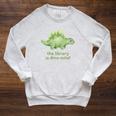 Women's The Library Is Dino-Mite Stegosaurus Reading Kids Book Raglan Sleeve Sweatshirt Heather Mustard