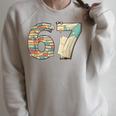 67 Book Stack Literary Adventure Reader Raglan Sleeve Sweatshirt Heather Forest