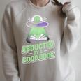 Abducted By A Good Book UFO Alien Reading Books Raglan Sleeve Sweatshirt Heather Forest