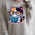 Adorable Book Lover Calico Cat With Reading Glasses Cute For Men Women Kids Raglan Sleeve Sweatshirt Heather Forest