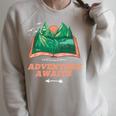 Adventure Awaits a Idea For Book Lovers Raglan Sleeve Sweatshirt Heather Forest