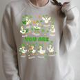 You Are Affirmations Goose StPatrick's Day Book Teacher Raglan Sleeve Sweatshirt Heather Forest