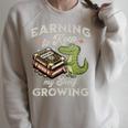Alligator Book Lover Reading Pun Bookish Humor Vibes Raglan Sleeve Sweatshirt Heather Forest Alligator Book Lover Reading Pun Bookish Humor Vibes Raglan Sleeve Sweatshirt Heather Forest