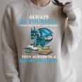 Always Be Yourself Unless You Can Be A Book Dragon Books Raglan Sleeve Sweatshirt Heather Forest