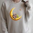 Astronaut Reading Book To Alien Moon Space Astronomy Raglan Sleeve Sweatshirt Heather Forest