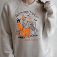 Banning-Books Reading Is A Right Now That’s Scary Halloween Raglan Sleeve Sweatshirt Heather Forest