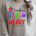 THE BEST TEACHERS TEACH FROM THE HEART NOT BOOK T-SHIRT Men Women Raglan Sleeve Sweatshirt Heather Forest THE BEST TEACHERS TEACH FROM THE HEART NOT BOOK T-SHIRT Men Women Raglan Sleeve Sweatshirt Heather Forest