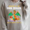 Beware Of The Book Dragon Mythical Creatures Raglan Sleeve Sweatshirt Heather Forest Beware Of The Book Dragon Mythical Creatures Raglan Sleeve Sweatshirt Heather Forest