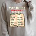 The Bible Book Of Emergency Numbers Religious Christian Raglan Sleeve Sweatshirt Heather Forest