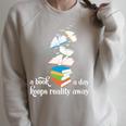 A Book A Day Keeps Reality Away Literature Reading Raglan Sleeve Sweatshirt Heather Forest