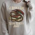 A Book A Day Keeps Reality Away Raglan Sleeve Sweatshirt Heather Forest