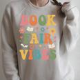 Book Fair Vibes Groovy Retro School Reading Nostalgic Raglan Sleeve Sweatshirt Heather Forest