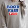 Book Fair Vibes Kids Retro Book Fair Book Lover Raglan Sleeve Sweatshirt Heather Forest