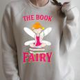 The Book Fairy Reading Teacher Librarian Men Women Raglan Sleeve Sweatshirt Heather Forest