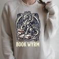 Book Lover I'm a Bookwyrm Not A Bookworm Fantasy Library Fan Premium Tri-Blend Raglan Sleeve Sweatshirt Heather Forest Book Lover I'm a Bookwyrm Not A Bookworm Fantasy Library Fan Premium Tri-Blend Raglan Sleeve Sweatshirt Heather Forest
