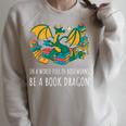 Book Lover In A World Full Of Bookworms Be A Book Dragon Raglan Sleeve Sweatshirt Heather Forest