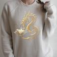 Book Lovers Dragon Fantasy Art Mythical Creatures Yellow Bookworm Chinese Dragon Raglan Sleeve Sweatshirt Heather Forest