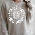 Book Reading Support Your Local Library Raglan Sleeve Sweatshirt Heather Forest