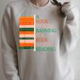 A Book Worth Banning Is a Book Worth Reading Banned Books Raglan Sleeve Sweatshirt Heather Forest