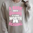 A Book Worth Banning Is A Book Worth Reading Librarian Raglan Sleeve Sweatshirt Heather Forest
