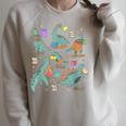 Bookish Dinosaur Animal Lover Book School Librarian Raglan Sleeve Sweatshirt Heather Forest