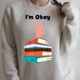 Too Many Books Book Lover I'm Okay Book Lovers Day Raglan Sleeve Sweatshirt Heather Forest