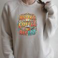 Books Coffee Repeat Cozy Reading Lifestyle Premium Tri-Blend Raglan Sleeve Sweatshirt Heather Forest