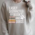 Books And Dogs Easily Distracted For Dog Mom Dog Dad Reader Raglan Sleeve Sweatshirt Heather Forest